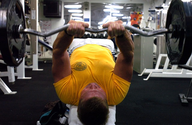 man doing bench press exercise