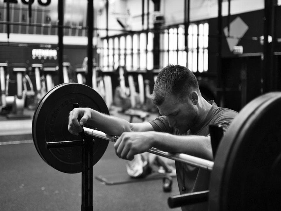 man doing strenth training exercises