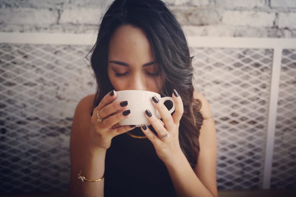 woman drinking coffee