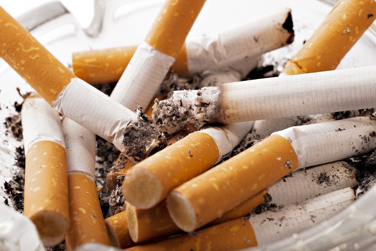 ash tray full of cigarette butts