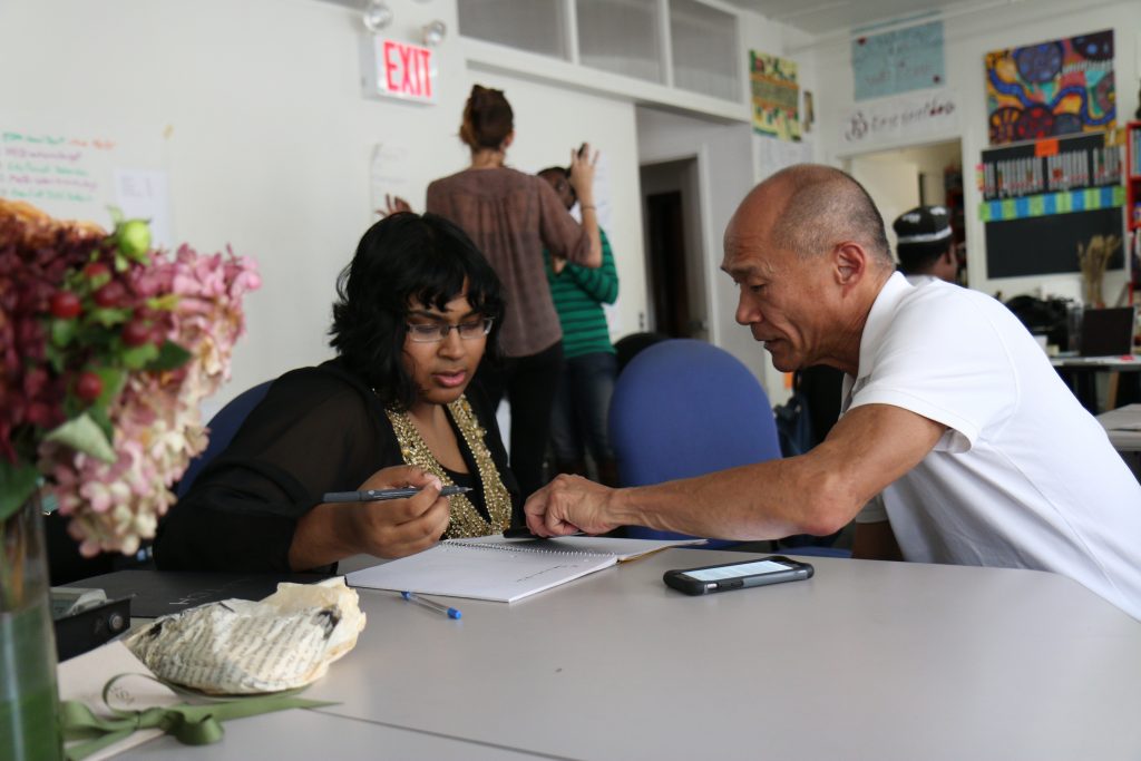student working with a mentor