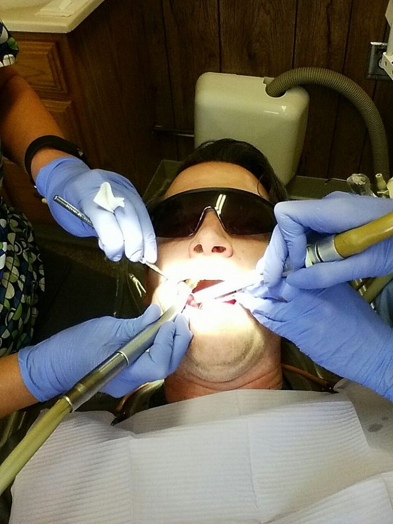 wisdom teeth removal man in dentist chair