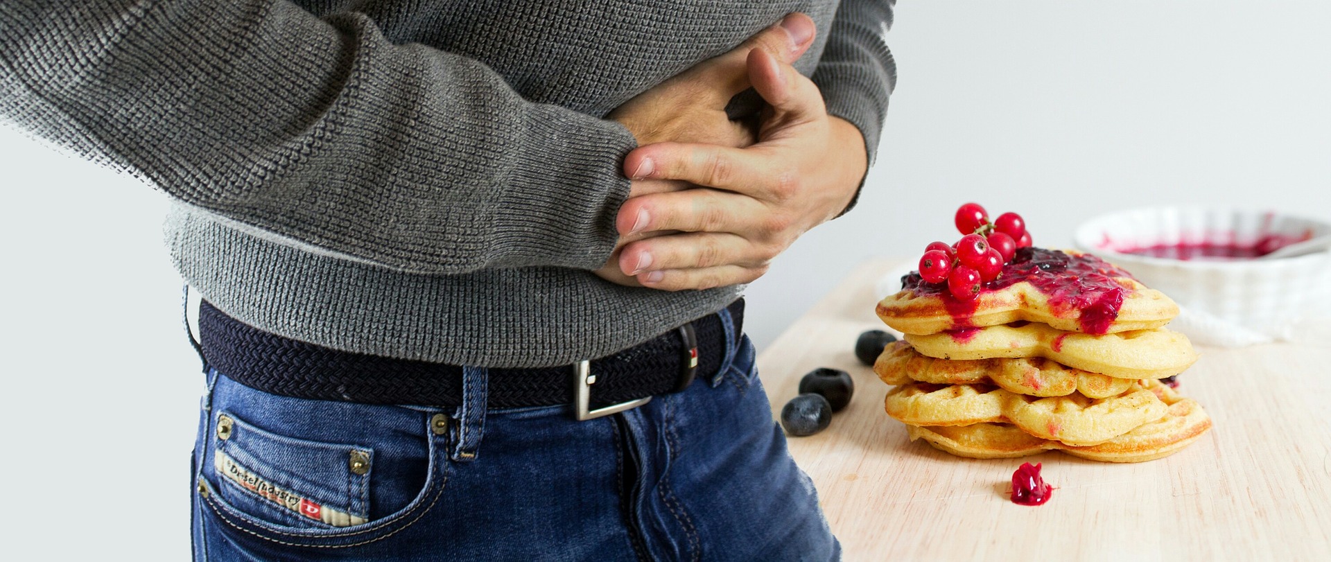 man with upset stomach